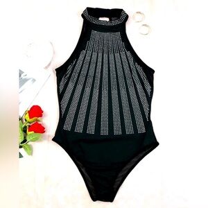 New studded body suit. Black, size small. From Infinity Boutique
